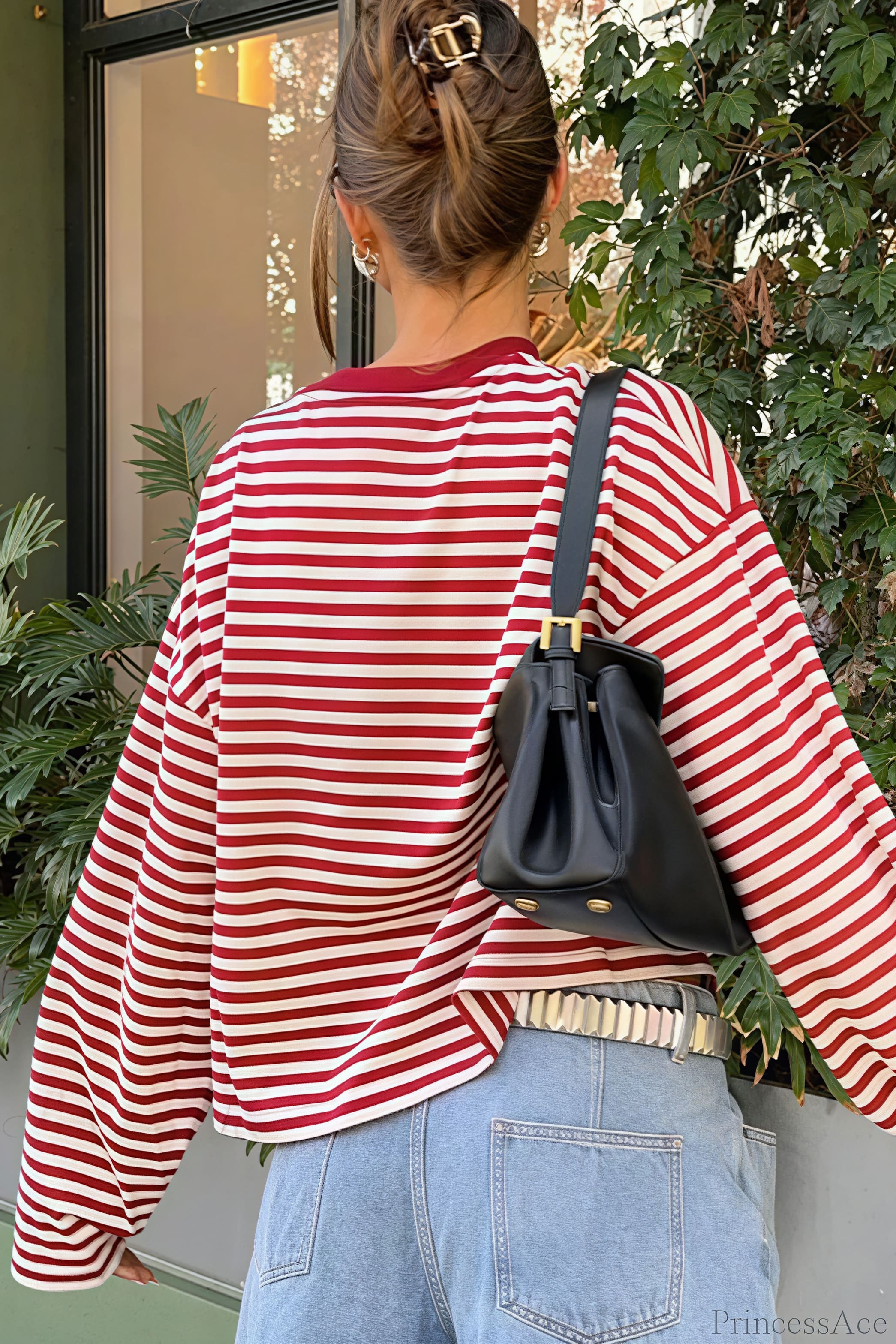 Camiseta holgada de manga larga con cuello redondo y bloques de color a rayas