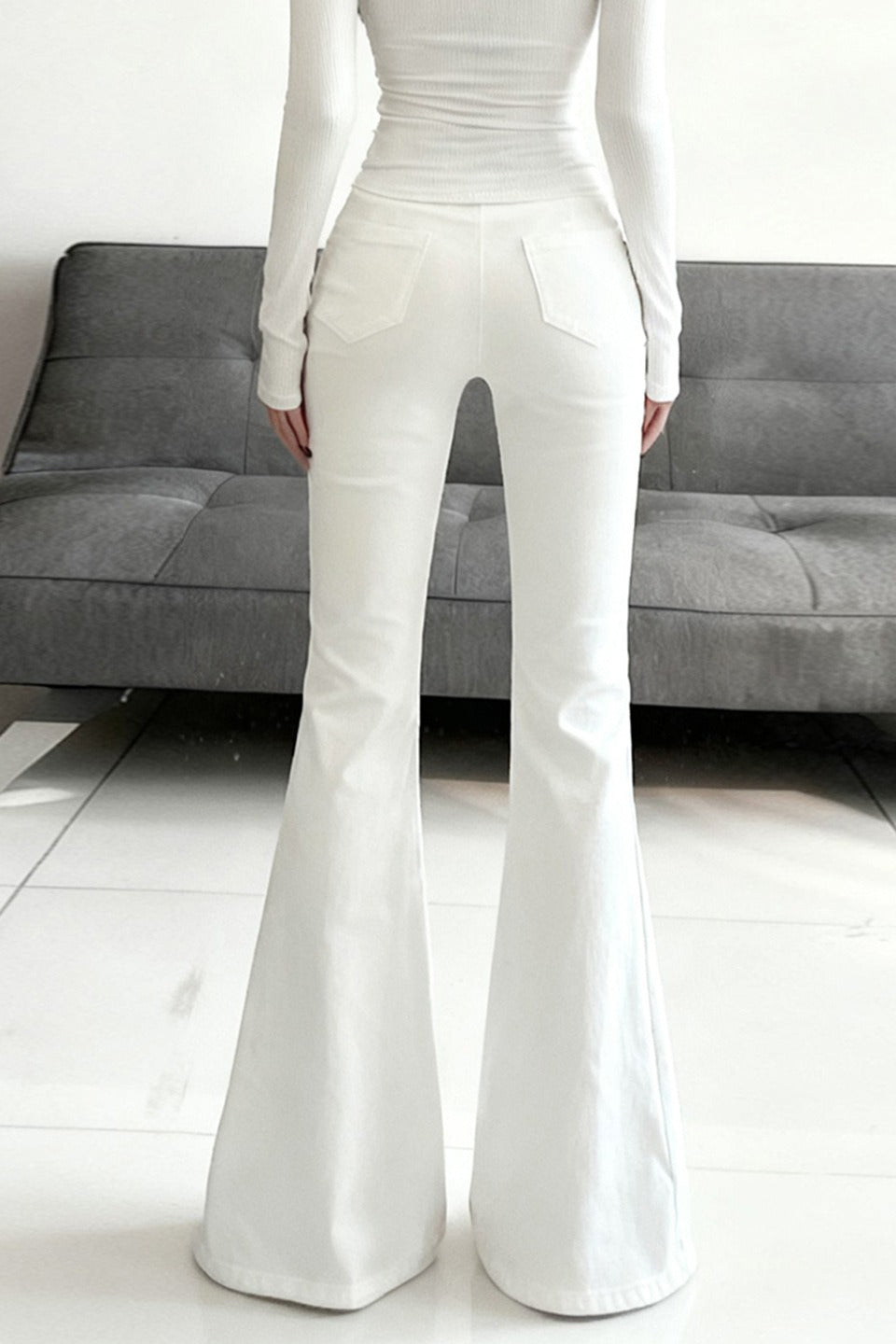 Jean décontracté blanc extensible taille basse coupe évasée