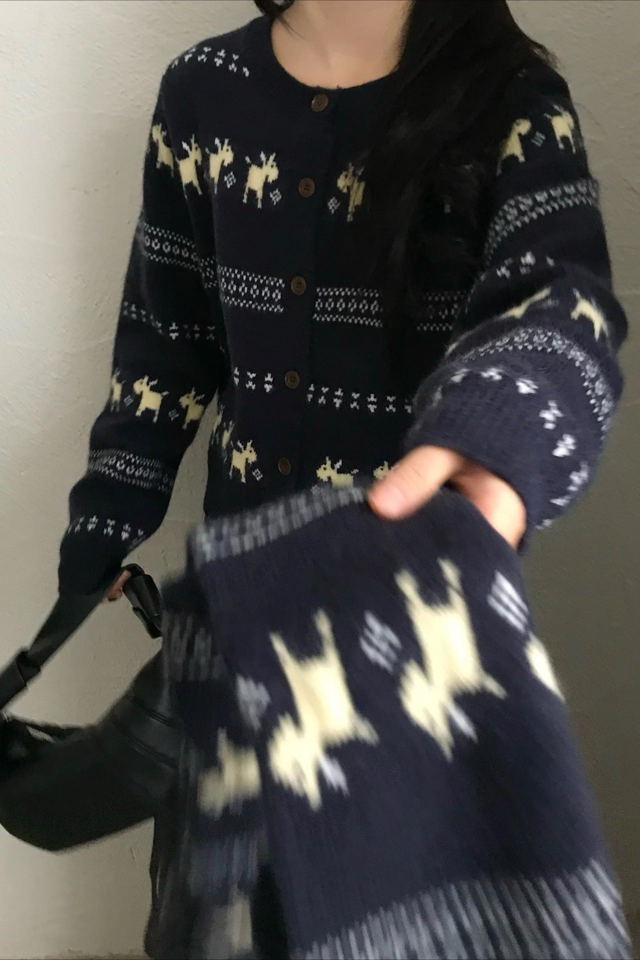 Cardigan tricoté à pompons