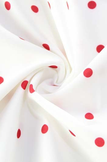 Robe courte à pois avec nœud décoratif