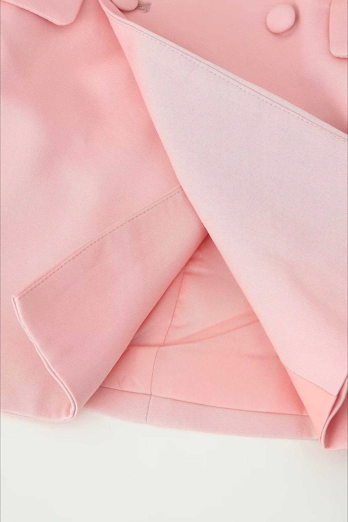 Blazer rosa con botones