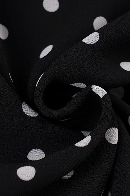 Midi-Rock mit Wickelbindung und Tupfenmuster