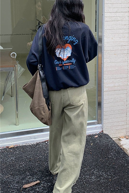 Jeans a vita alta con tasche laterali, gamba larga e sagomata