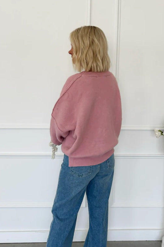 Sweat ample à panneaux avec nœud en relief 3D