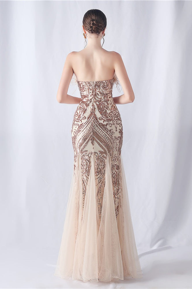 Abito da sera per festa con paillettes e piume di struzzo