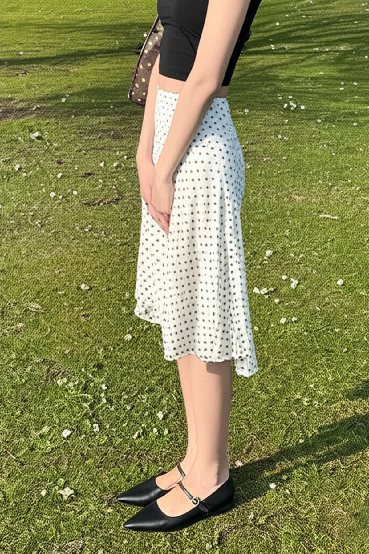 Rock mit Tupfenmuster und Netzstoff in Lagen