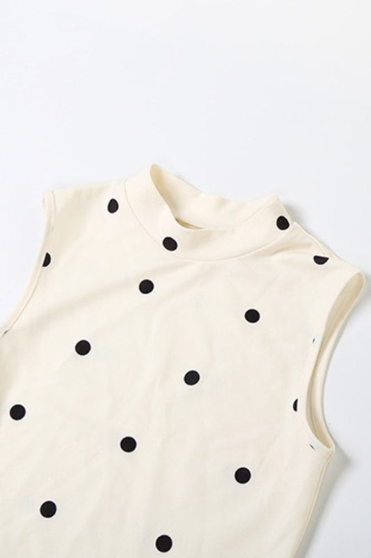 Robe courte à encolure ronde, taille cintrée, motifs à pois bicolores avec nœud