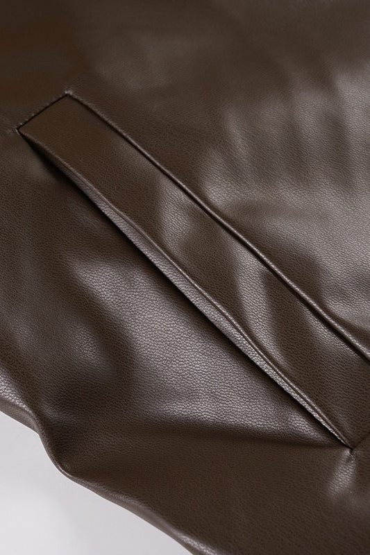 Veste en cuir avec col en fourrure assemblée