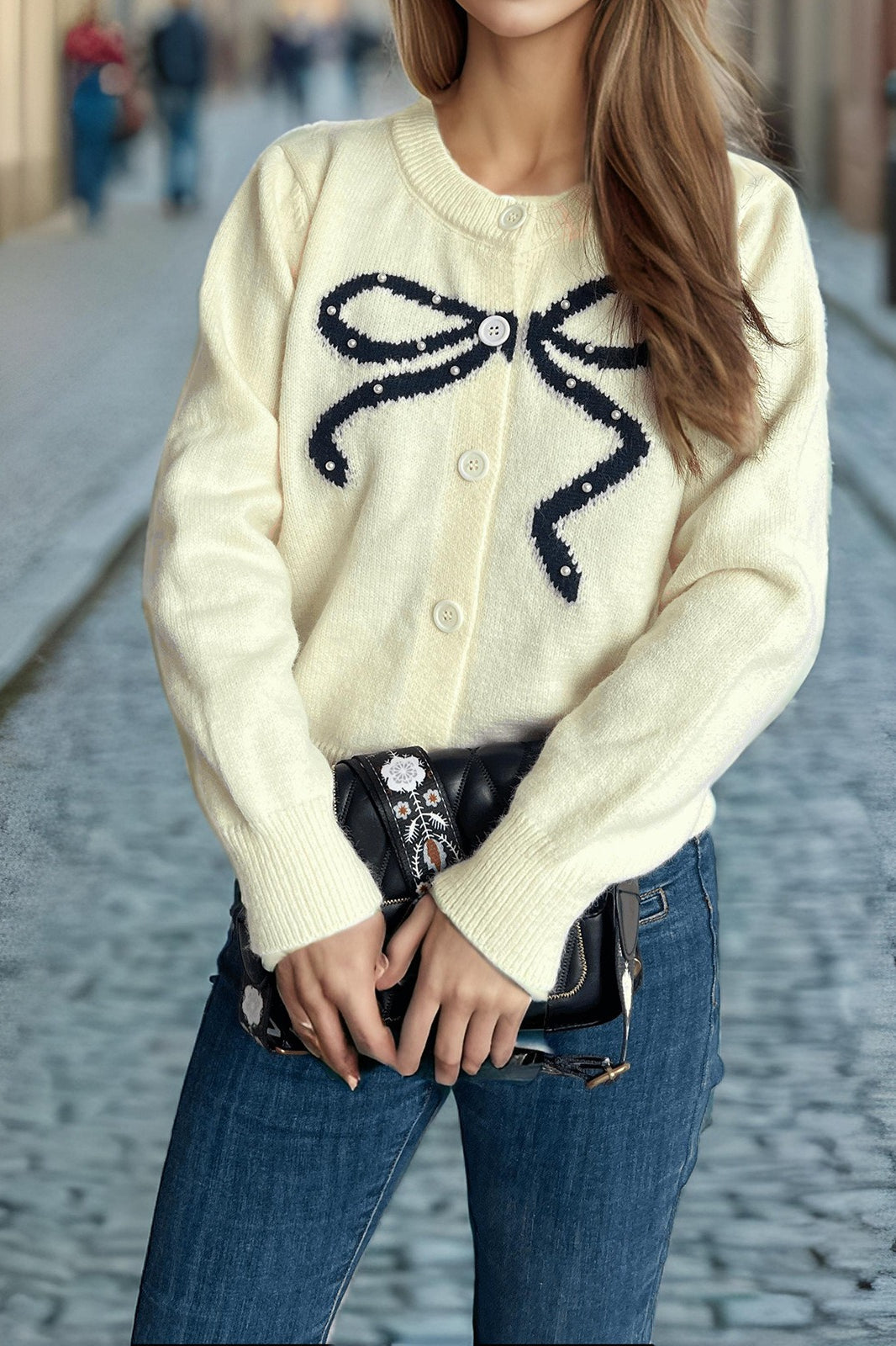 Cárdigan redondo de jacquard con lazo sólido