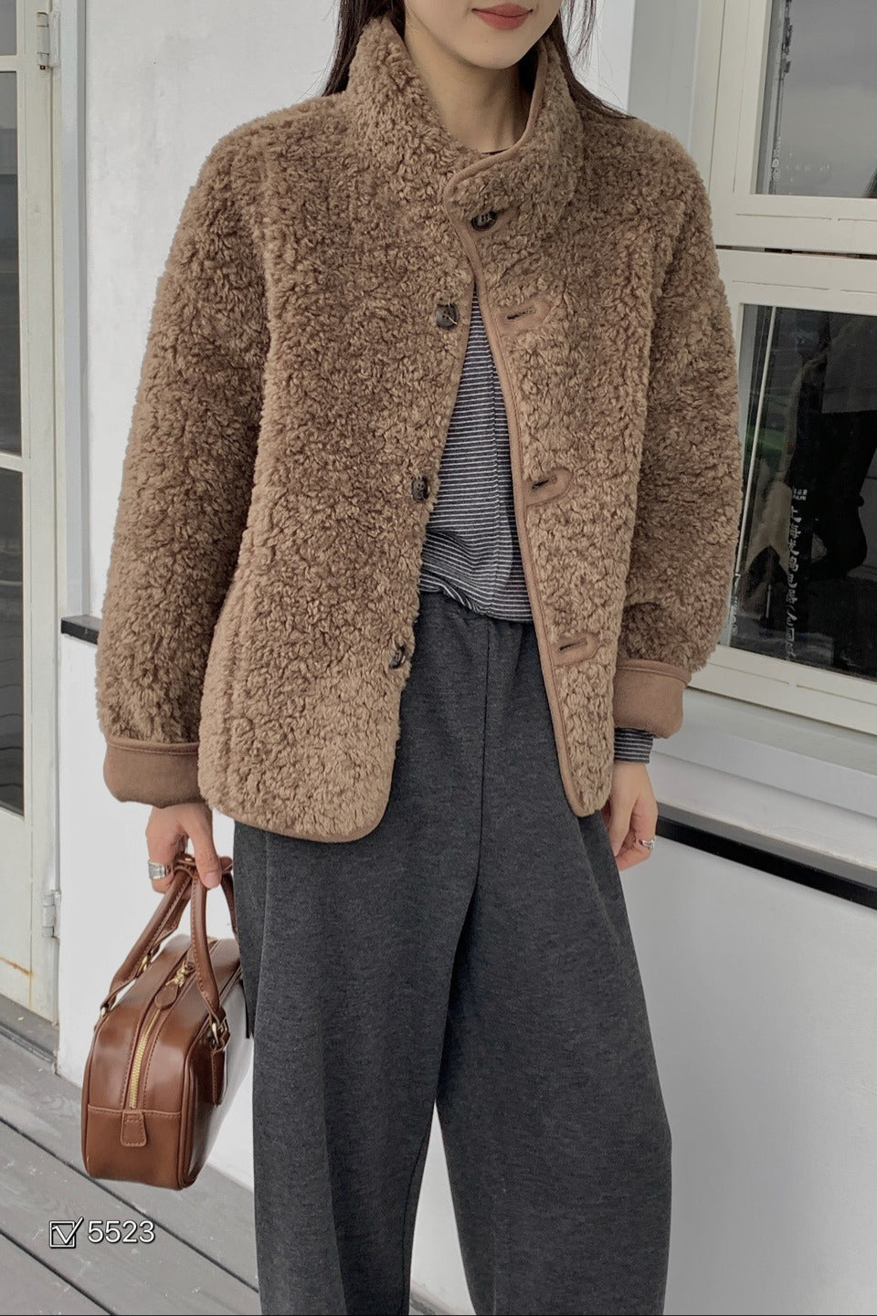 Manteau réversible en fourrure à col souple