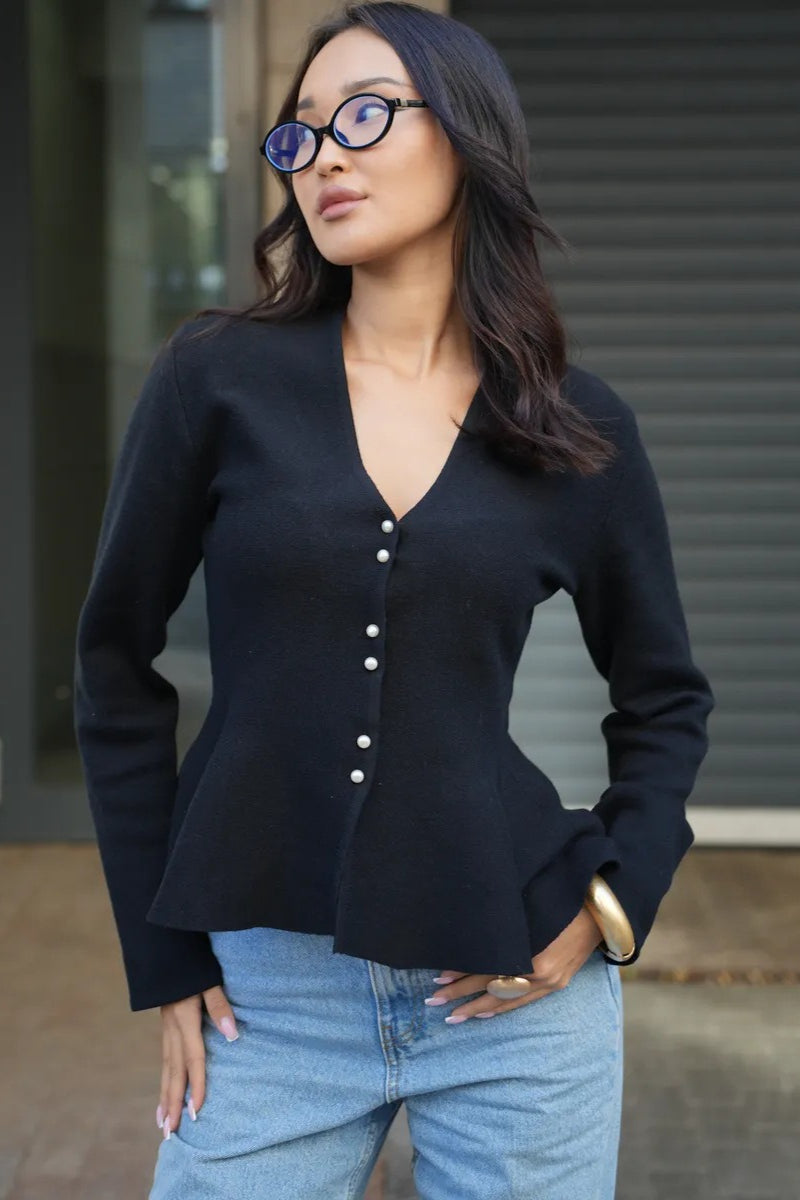 Cárdigan de punto ajustado con volante en el dobladillo y mangas largas