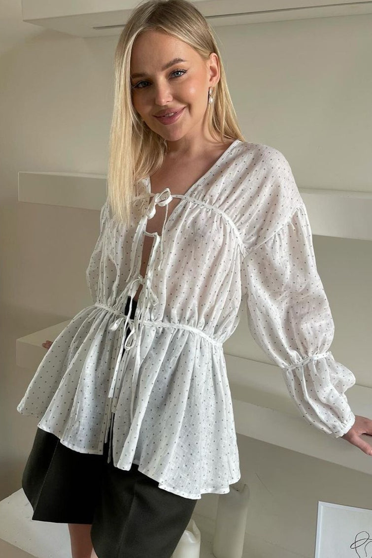 Haut court ample à manches longues avec col en V et lien