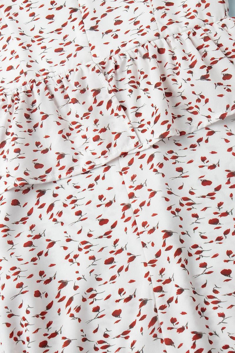 Kleid mit Puffärmeln, tailliertem Schnitt und Blumenmuster