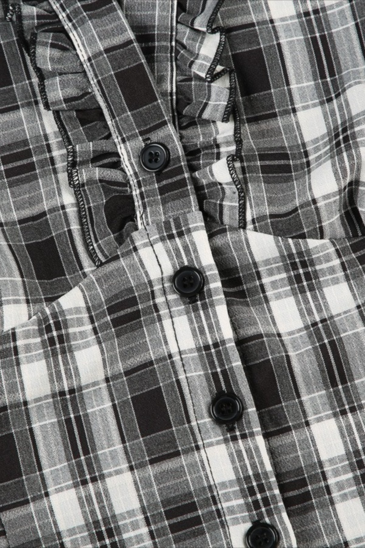 Camicia scozzese a quadri con scollo a V e maniche a sbuffo arricciate