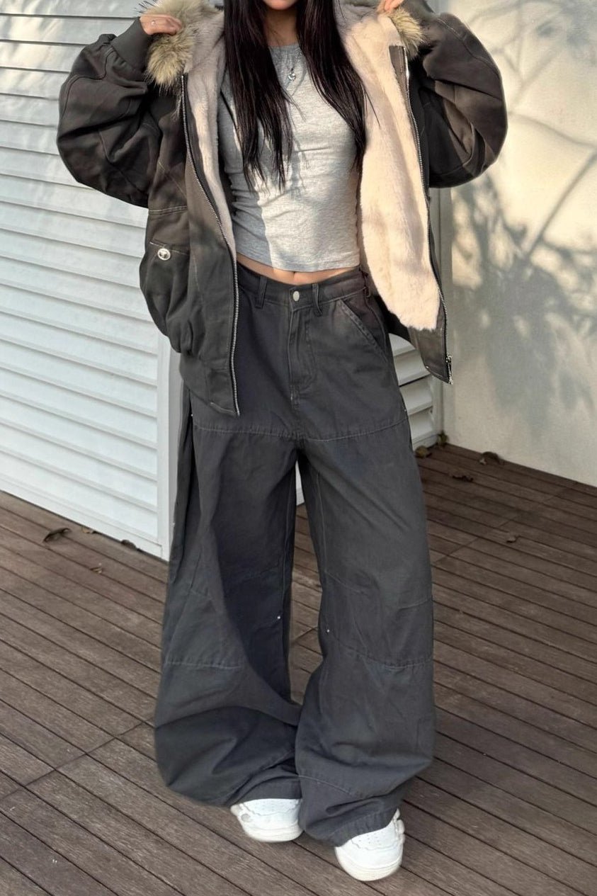 Veste courte noire matelassée avec col en fourrure