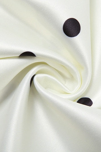 Robe courte à pois avec col licou et bordure en dentelle