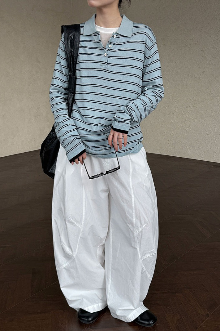 Maglia a maniche lunghe con collo polo a righe in lana morbida