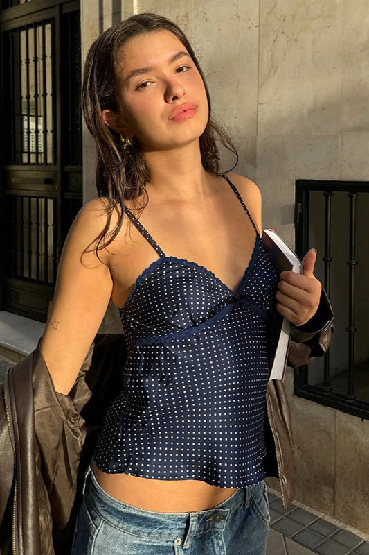 Top sexy a pois con pizzo e blocchi di colore