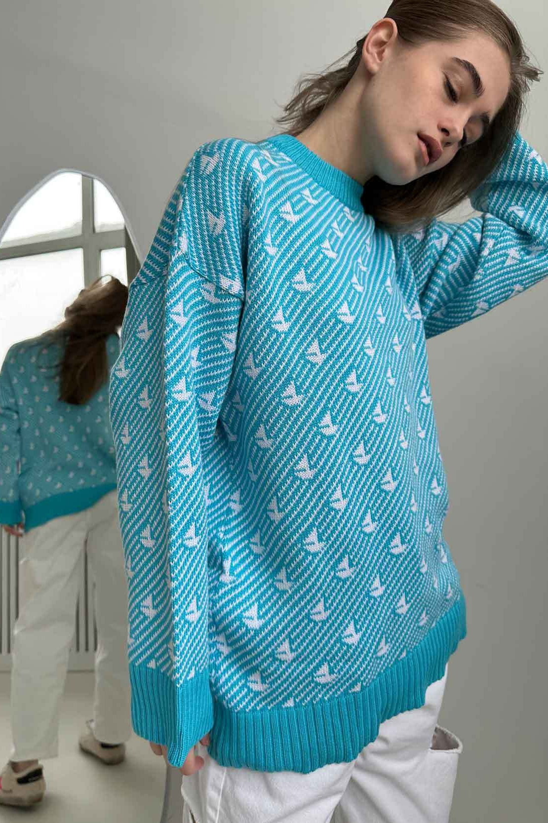 Pull tricoté à col rond motif voilier