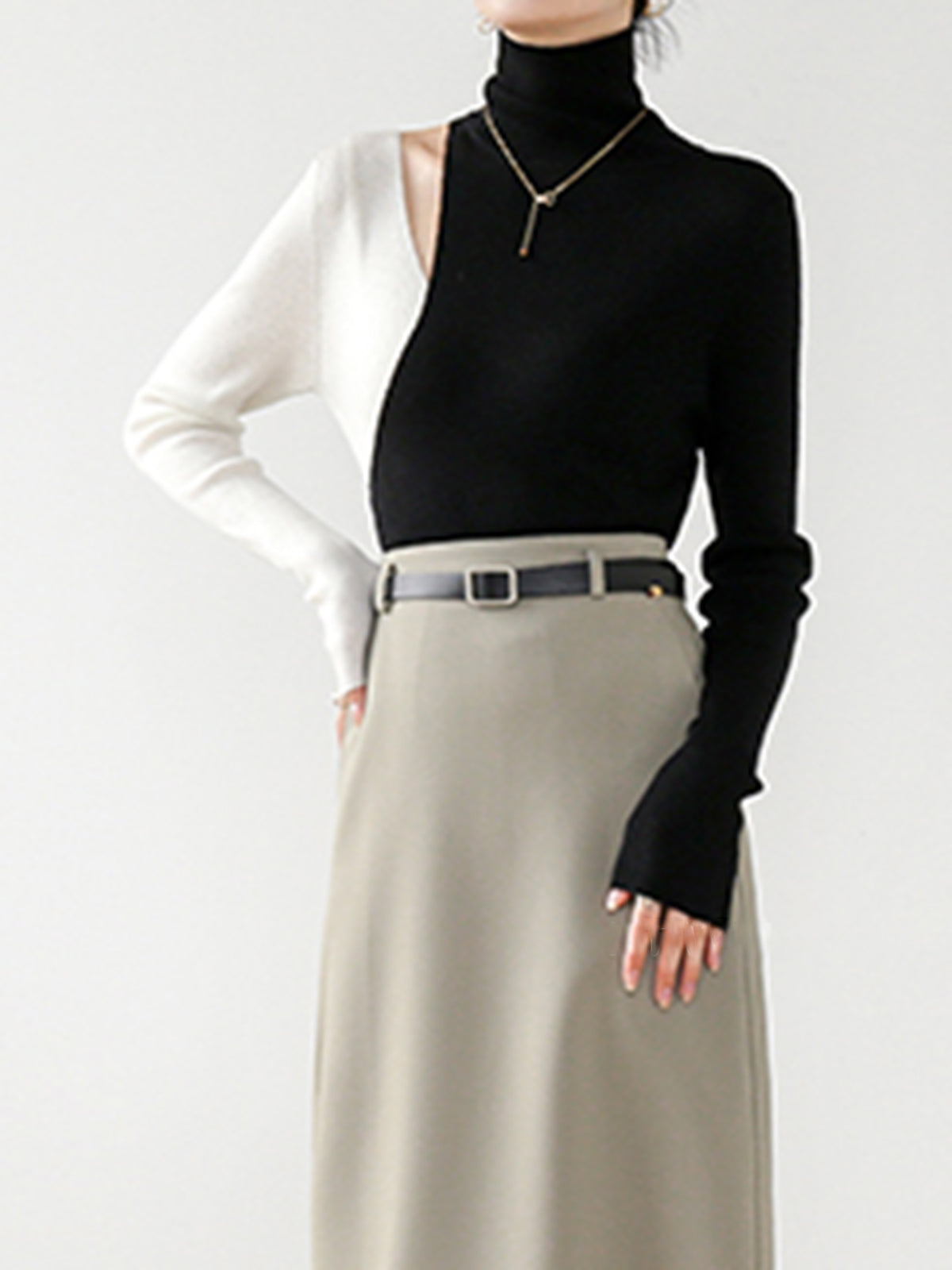 Maglia a blocchi di colore con ritagli