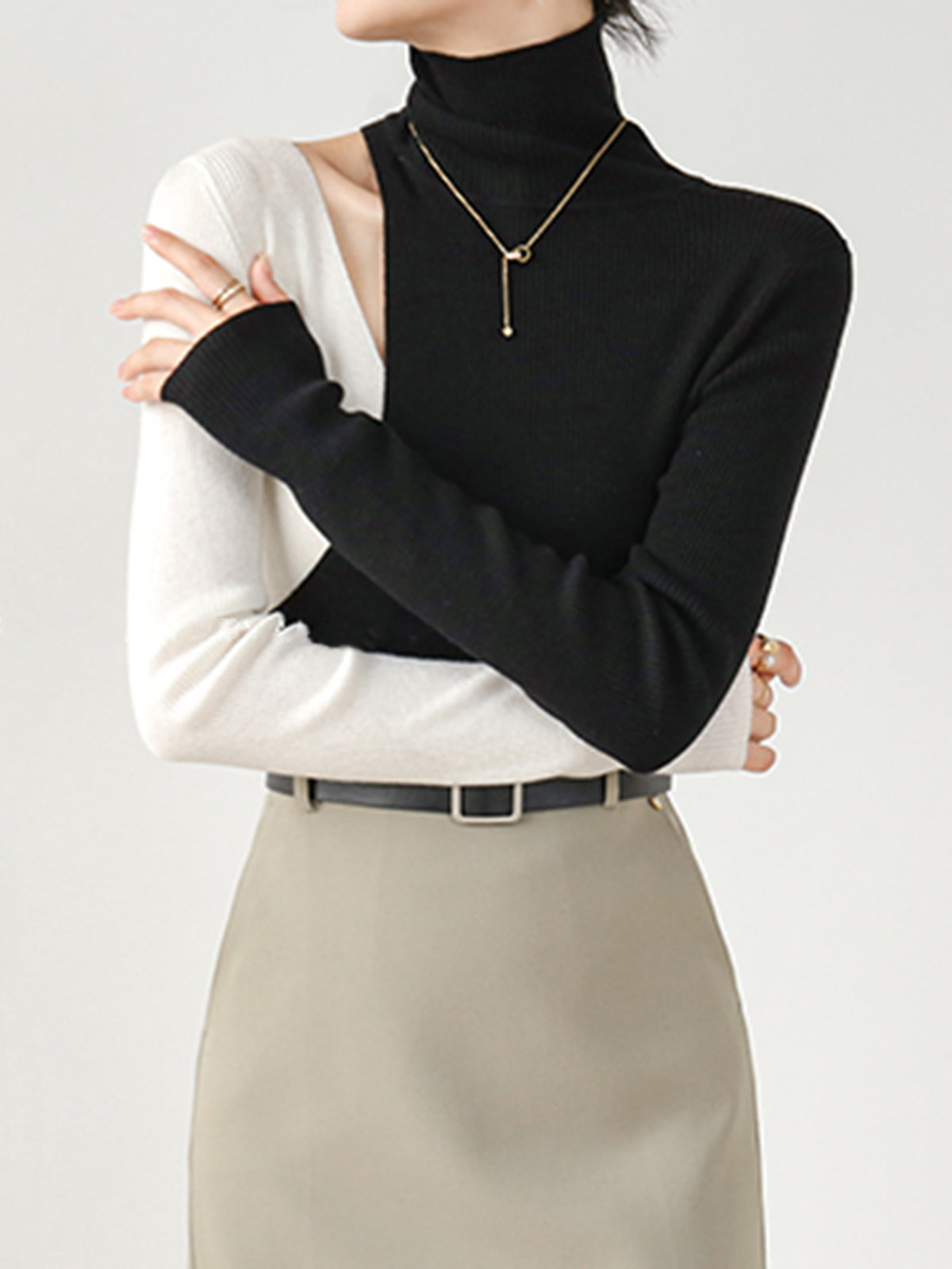 Maglia a blocchi di colore con ritagli