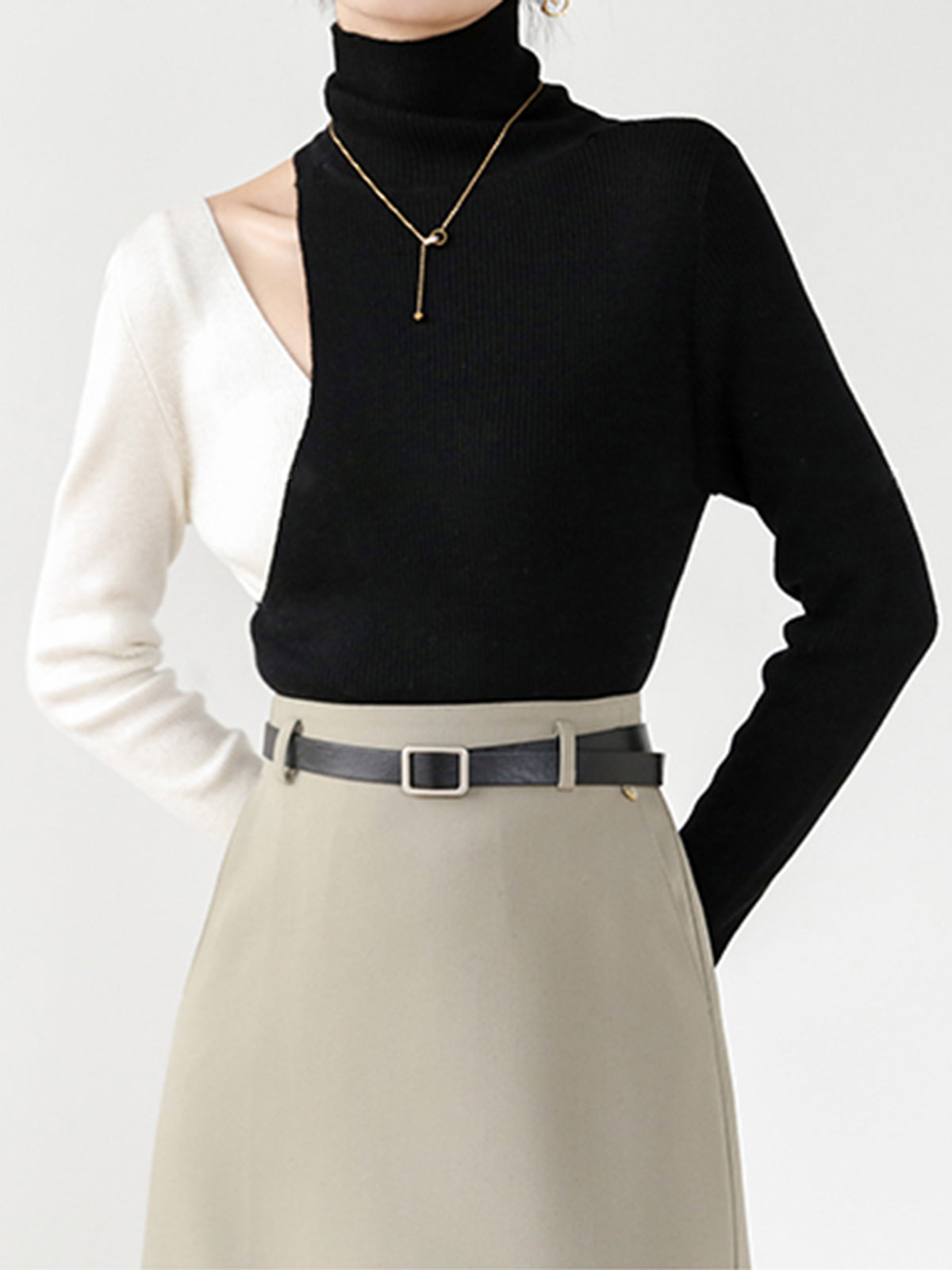 Maglia a blocchi di colore con ritagli