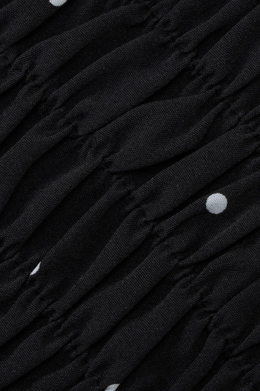 Top corto de lunares con volantes y atado al cuello