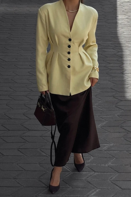 Blazer elegante de manga larga