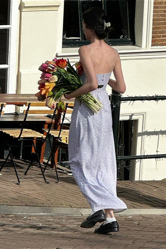 Vestido largo floral con tirantes finos y volantes