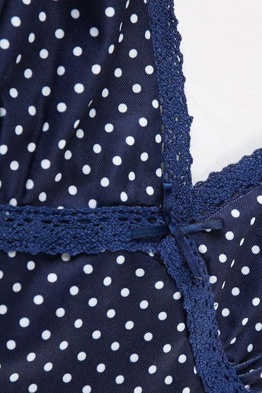 Top sexy a pois con pizzo e blocchi di colore