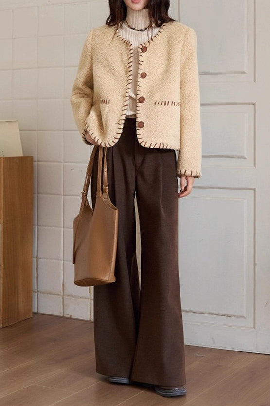 Abrigo elegante de lana texturada bicolor