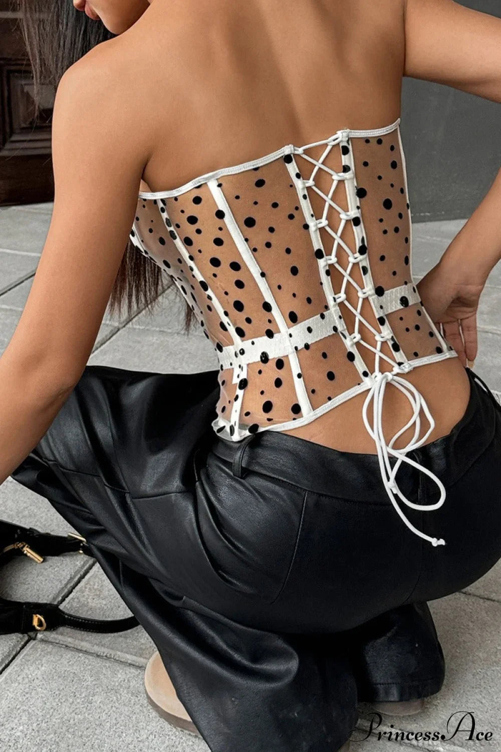 Corsetto a pois bianchi e neri bustier
