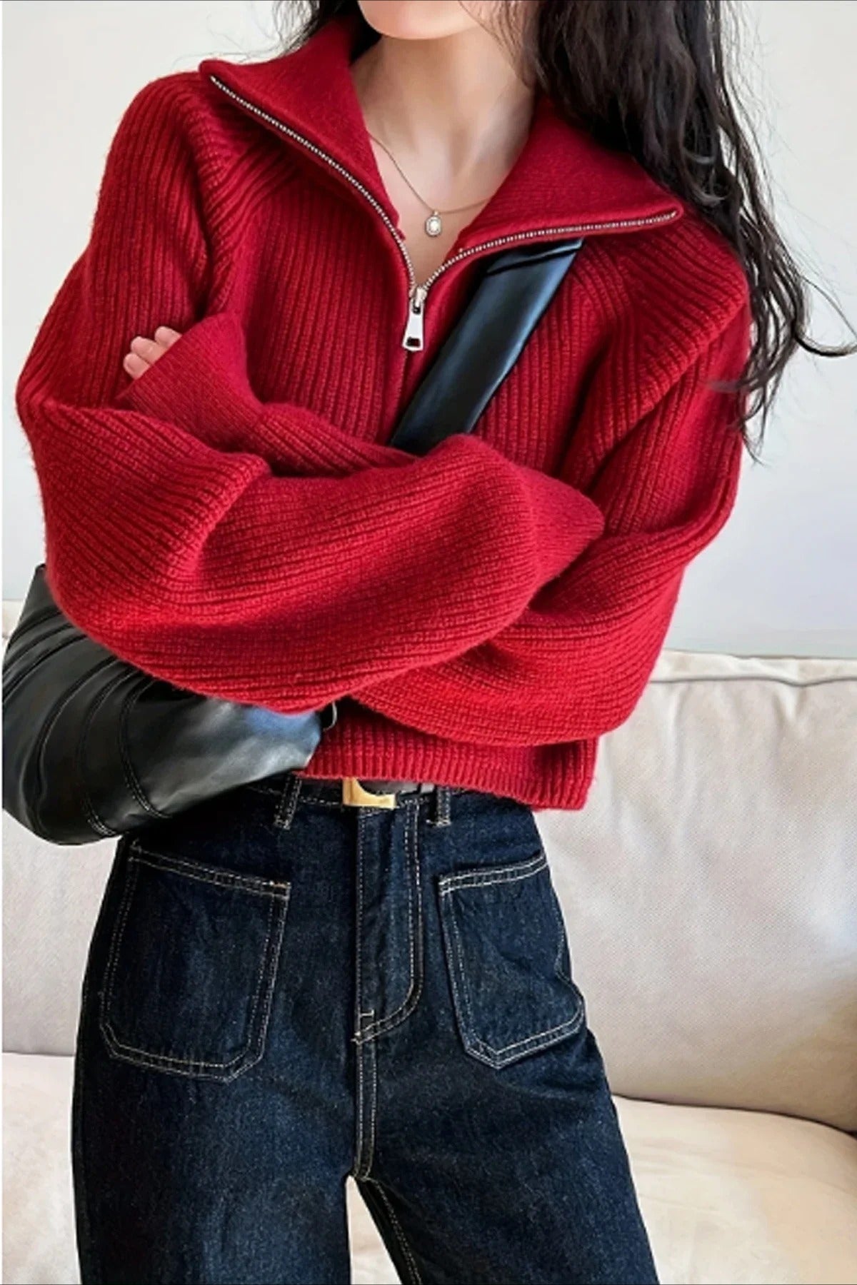 Pullover mit halbem Reißverschluss und Rollkragen aus Strick