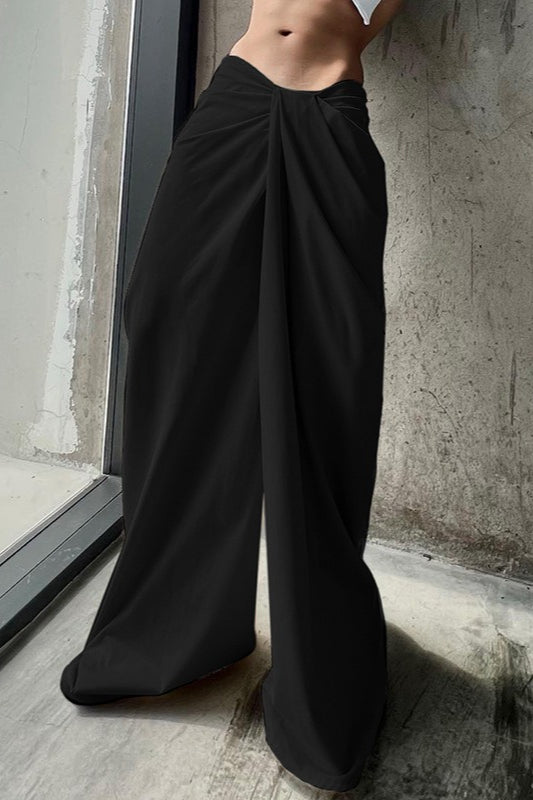 Pantalones anchos de pierna recta con giro asimétrico sólido