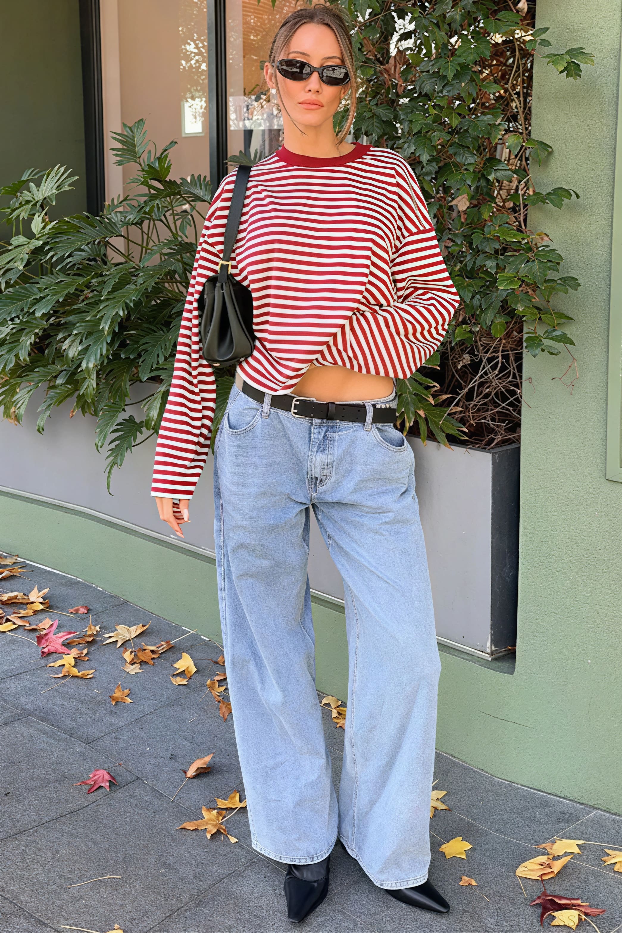 Camiseta holgada de manga larga con cuello redondo y bloques de color a rayas