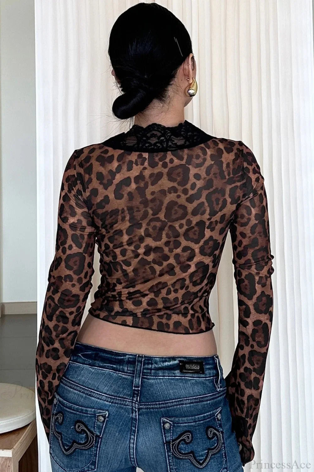 Schicke Bluse mit Leopardenmuster, Netzstoff und Spitzenbesatz