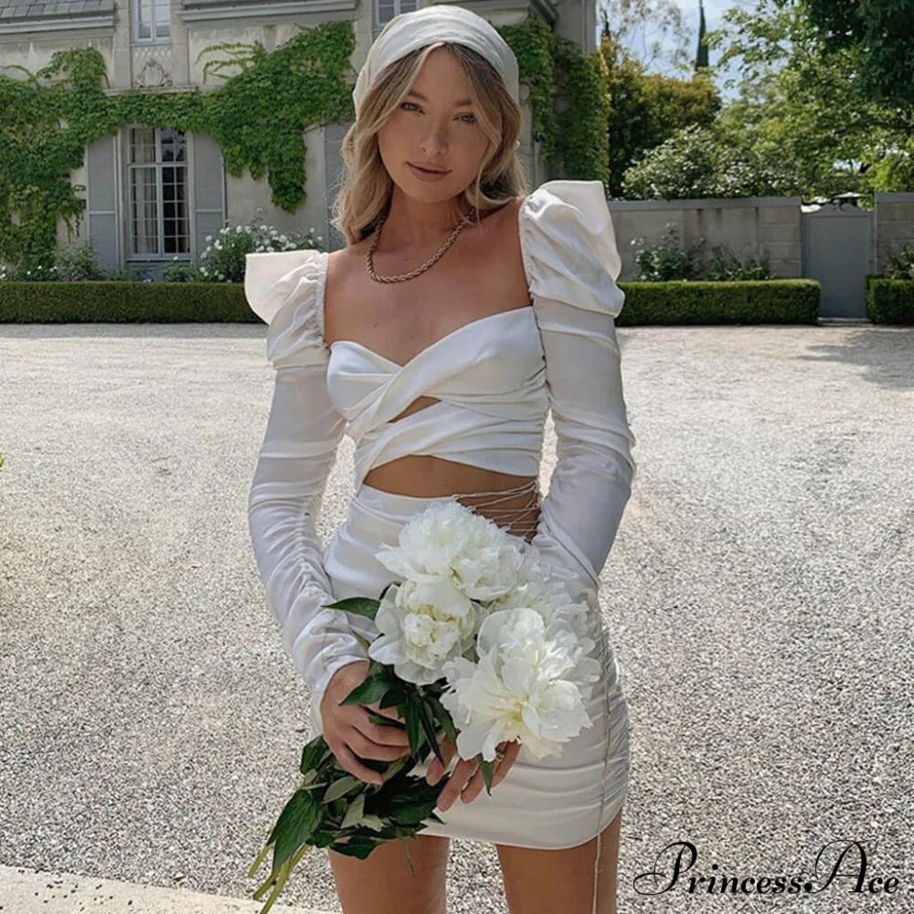 Vestido Elegante com Mangas Bufantes e Recortes