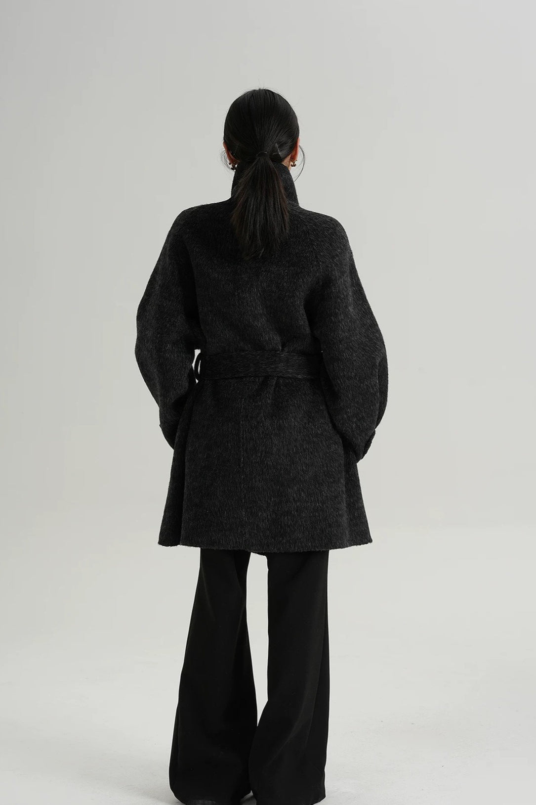 Abrigo suelto de lana sólida cálido con cuello alto simulado elegante