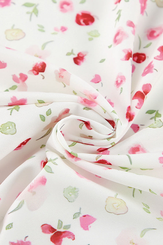 Kleid mit Puffärmeln, schmaler Taille und langem Blumenmuster