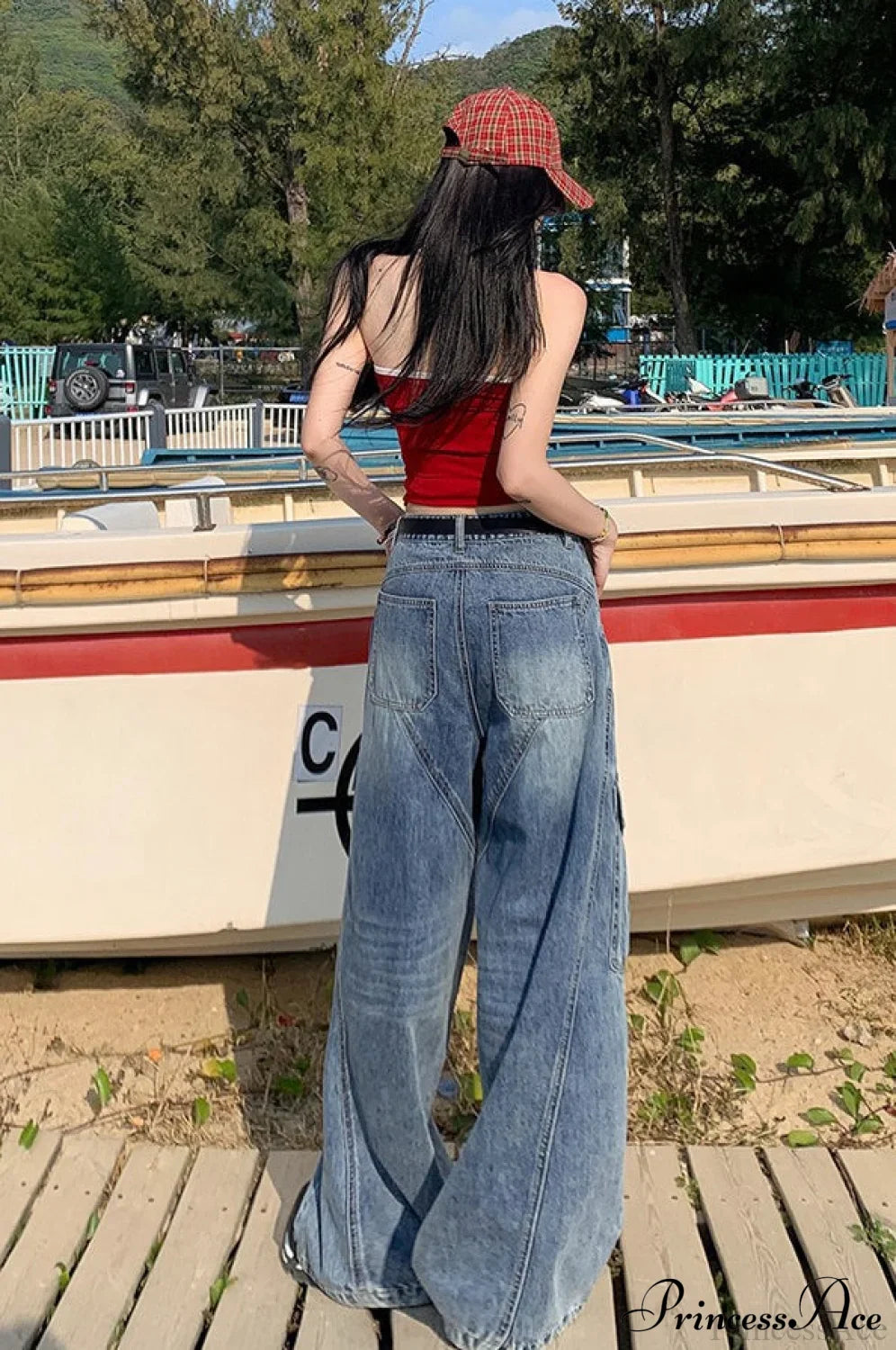 Džíny s diagonálním rozparkem a širokými nohavicemi s kapsami