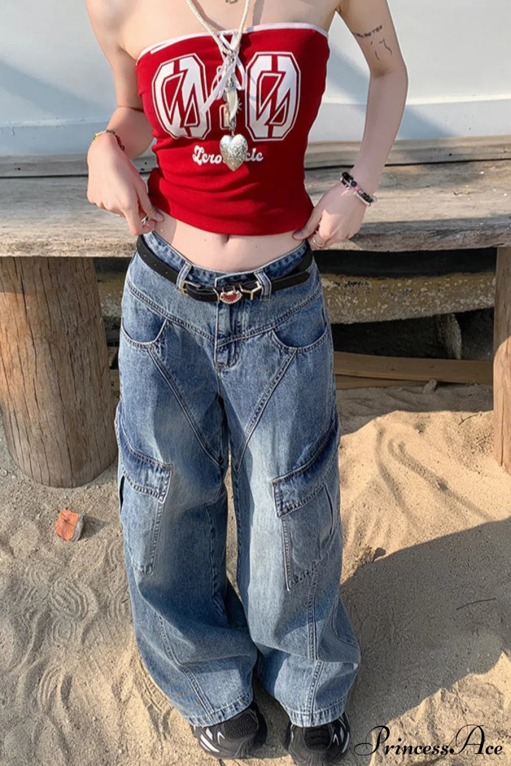 Džíny s diagonálním rozparkem a širokými nohavicemi s kapsami