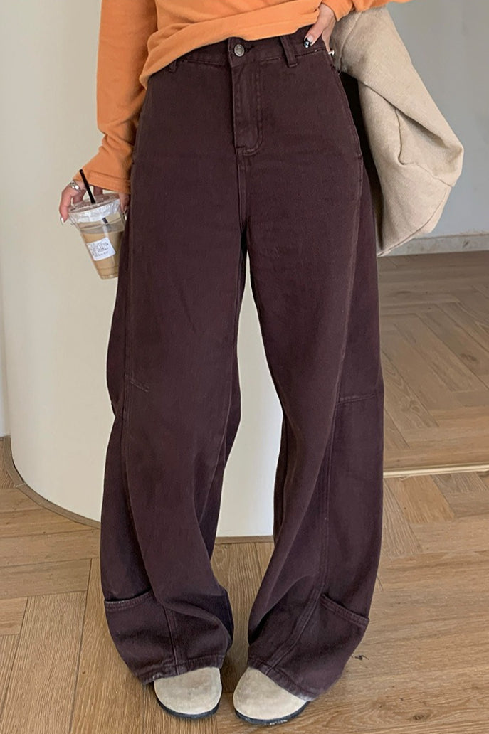 Jeans a vita alta con tasche laterali, gamba larga e sagomata