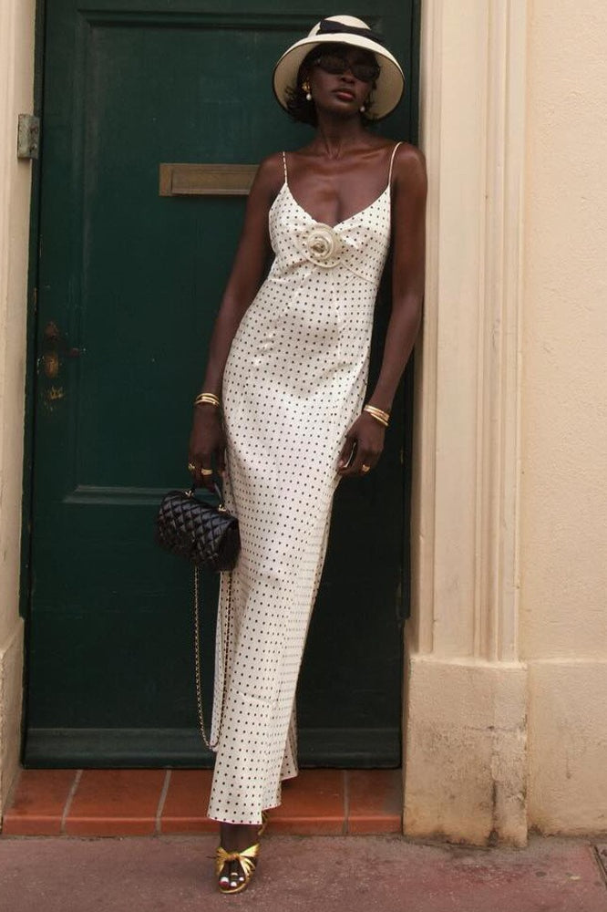 Abito lungo aderente con spalline sottili e schiena scoperta stampato