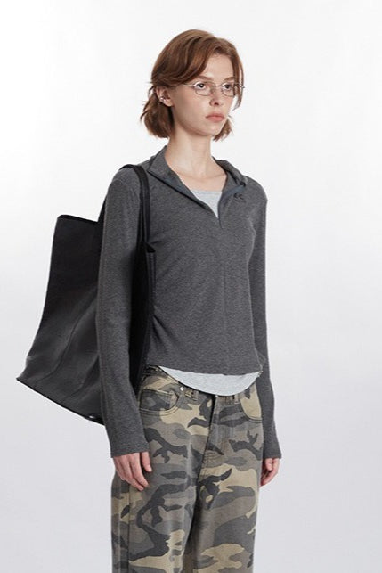 Gestricktes Oberteil mit halbem Reißverschluss und Stehkragen in zwei Teilen