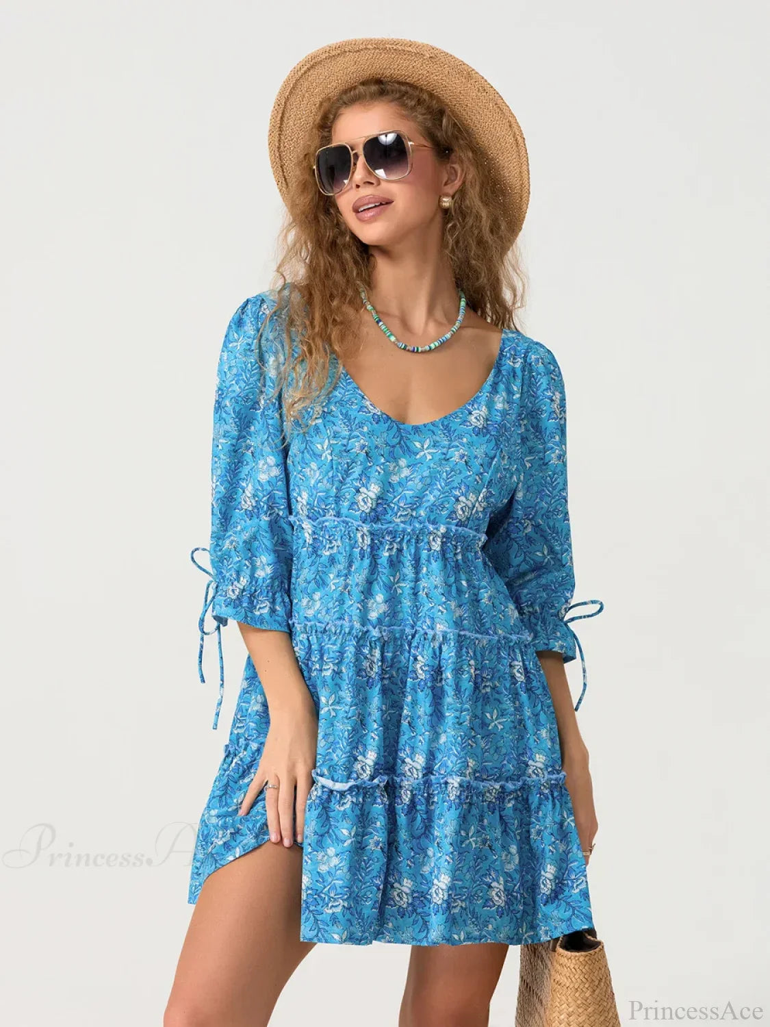 Vestido floral con volantes en capas, escote en V y mangas abullonadas hasta el codo
