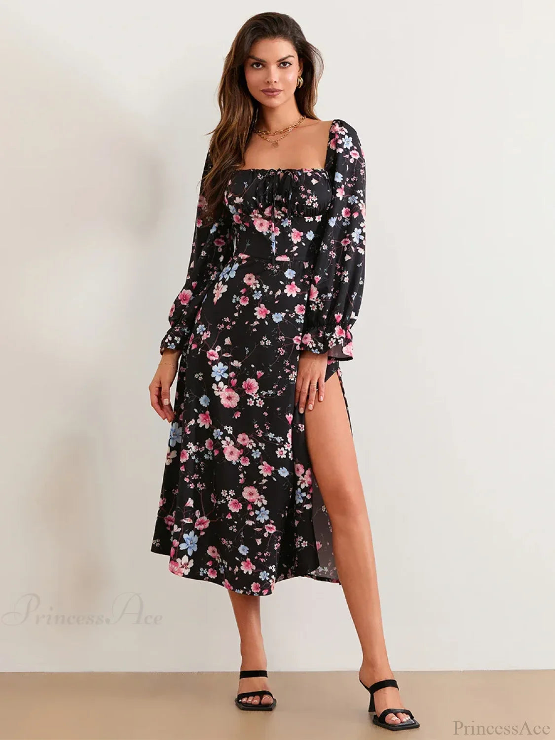 Vestido floral elegante midi con mangas abullonadas y escote cuadrado