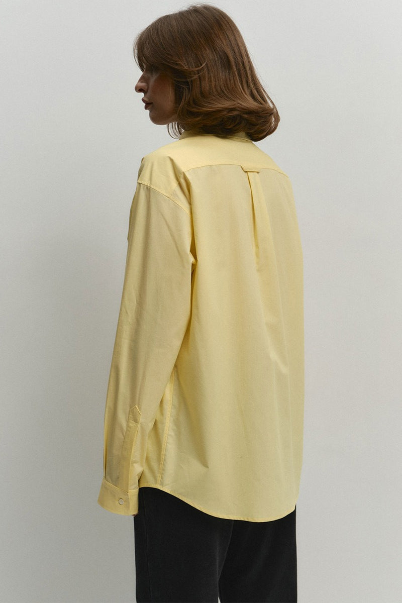 Blusa suelta amarilla de algodón con botones para el día a día