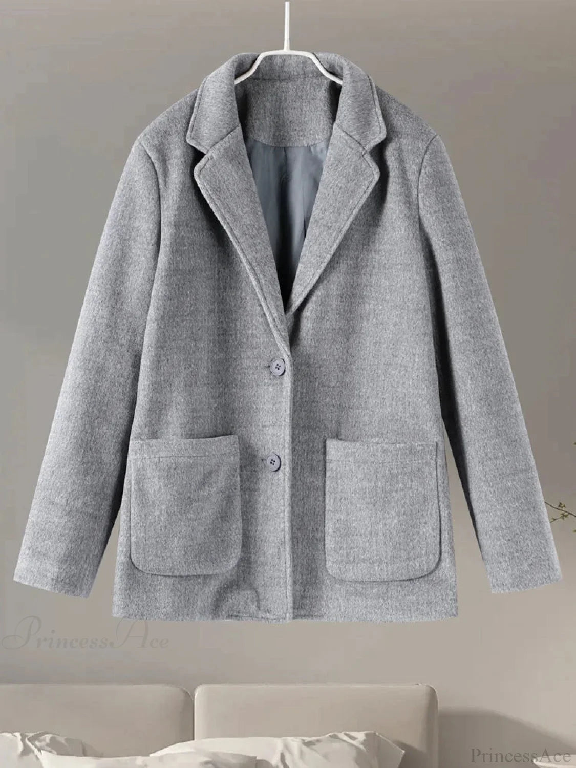 Cappotto grigio casual in lana con collo a lancia e bottoni frontali