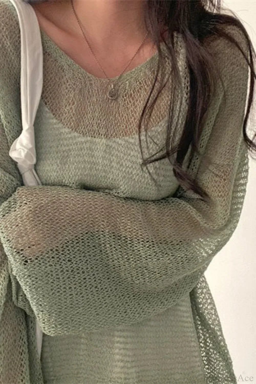 Blusa Chique de Malha com Manga Longa Solta e Trabalhada em Ponto Ajour