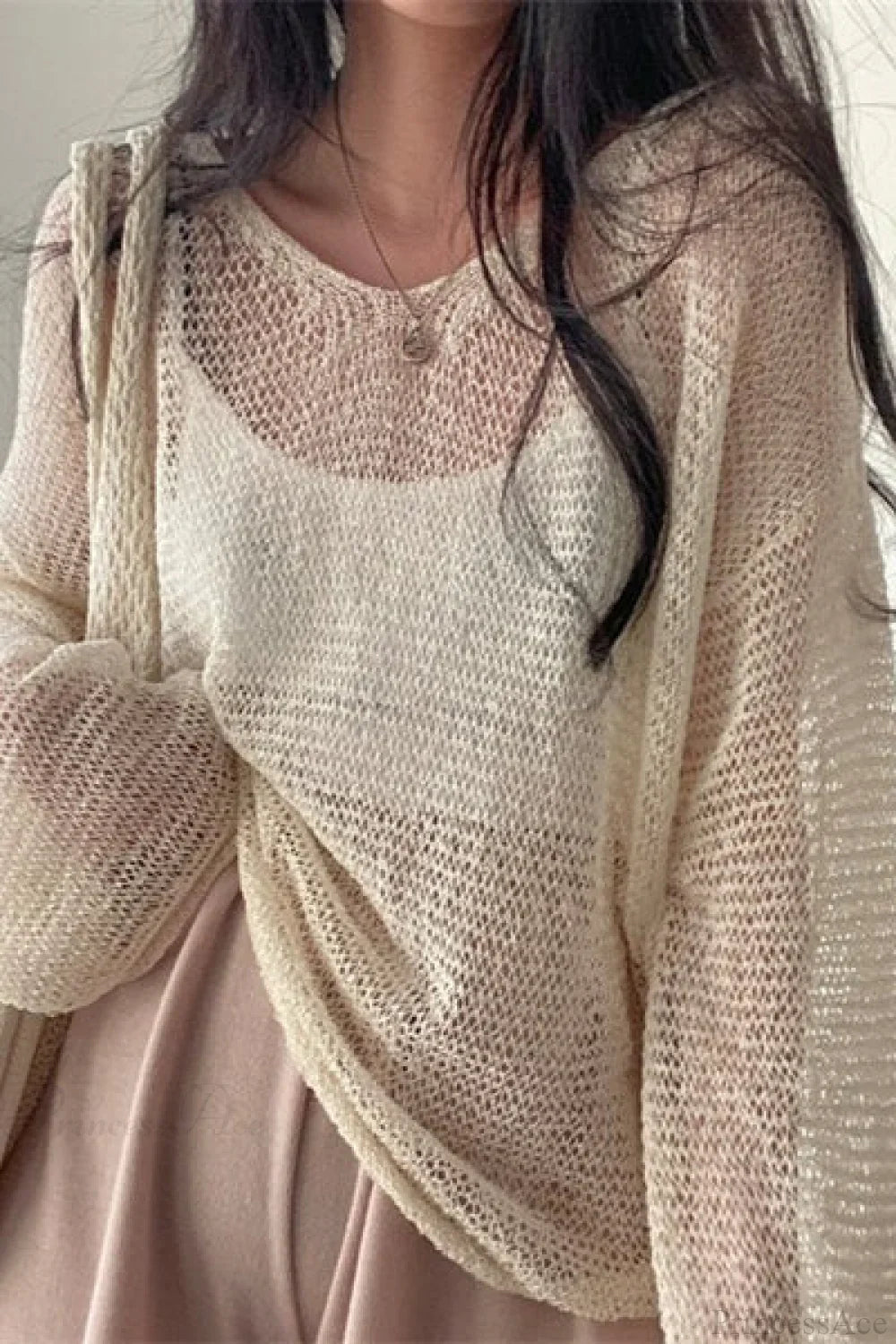 Blusa Chique de Malha com Manga Longa Solta e Trabalhada em Ponto Ajour